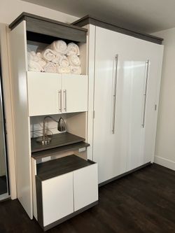 Murphy bed with pull out desk