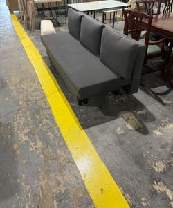 Small Gray Armless Sofa