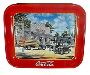 Vintage 1990's coca cola tin metal serving trays two never used one has artist Pamela renfroe signature on back located in palm springs ca excellent