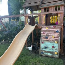 Backyard Wooden Playhouse With Slide & Swings 