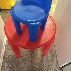 Table With 2 Blue Chairs