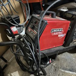 Lincoln Electric Welder SP-175 T With Cart, Welding helmet, And Supplies