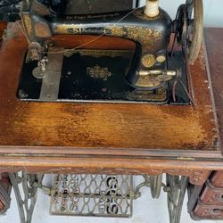 Vintage Singer Treadle Sewing Machine And Cabinet