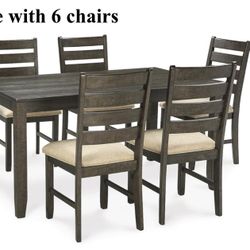 Wooden table with 6 chairs