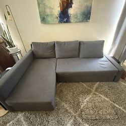 L-Shaped Couch With Storage And Pull-out Section