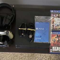 1TB PS4 with 2 Wireless Controllers, Headset & 2 Games
