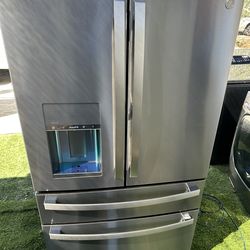 GE Profile 27.9 cu. ft. Smart 4-Door French Door Refrigerator with Door-in-Door in Fingerprint Resistant Stainless Steel.