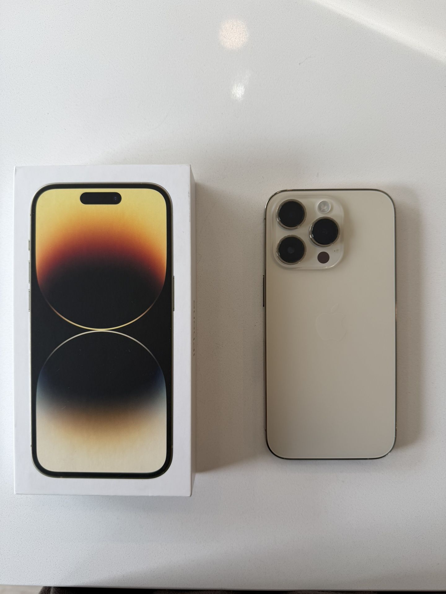 Used Gold apple iphone 14 pro factory unlocked like new 