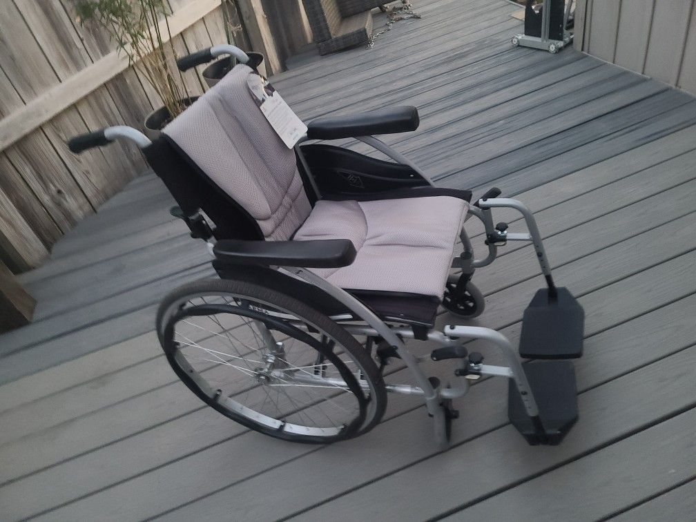 Wheel Chair And 2 Walkers