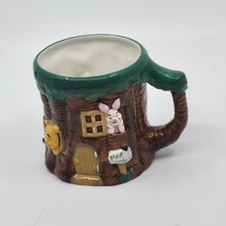 Disney Store Winnie The Pooh & Friends 3D Mug. Pre-owned, good shape, no 
chips or cracks. Please see photos for details.
It is 4.5" tall. Weight 14oz