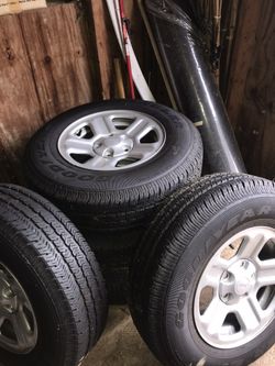 Tires and rims set of 5 Jeep