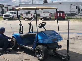 Golf cart paint and sound system