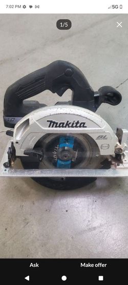 Makita 18v impact 1/2 driver and skill saw  with 5.0 battery comes with  charger