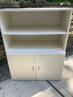White cabinet and white book shelf (2 pieces) made in Germany. Great price for the quality!