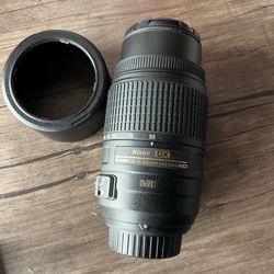 Nikon 55-300mm f/4.5-5.6 telephoto lens - sports - travel - photography  - portrait