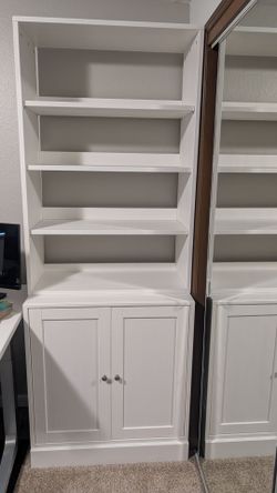 White IKEA cabinet with shelves