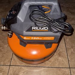RIDGID 6 Gal. 150 PSI Portable Electric Oil-Free Jobsite Pancake Air Compressor with Dual Pressure Gauges and 2-Quick Couplers
