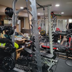 Life fitness smith machine and Life fitness adjustable bench.
