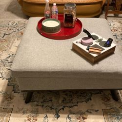 Gray Cloth Ottoman With Storage