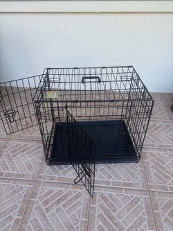 Dog crate pet cage 24” long 17” wide 19” tall double door