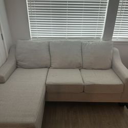 Small Light Grey Couch.