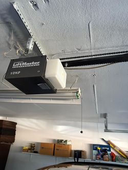 Garage Door Opener Broken Spring Off Track Replace Adjustment And Parts