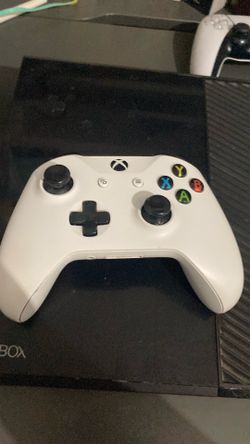 Black Xbox one , with white controller