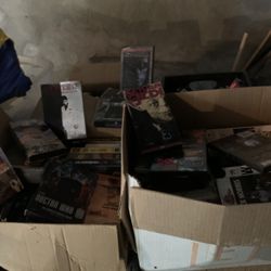 Large Lot Of VCR And DVD Tapes 