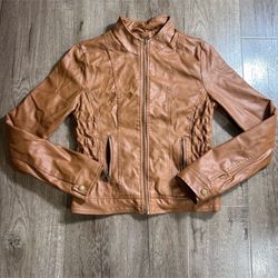 Women's leather jacket by New Look in cognac color.