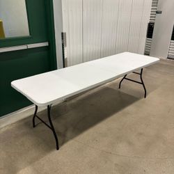 Extra large  8 feet long fold in half carry table ..  in Execellent condition $60