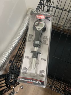 Brand new Rapala Fish Gripper with Scale