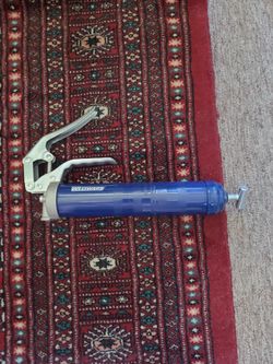 Grease gun. About 15" total length.  As New.  Never used.