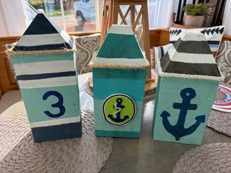 Three home decor wood coastal buoys
