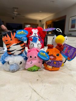 Small stuffed animals by Cats vs Pickles, Dogs vs squirls