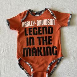 Harley-Davidson baby boy's romper is a cotton bodysuit featuring a motorcycle-themed design with "Legend in the Making