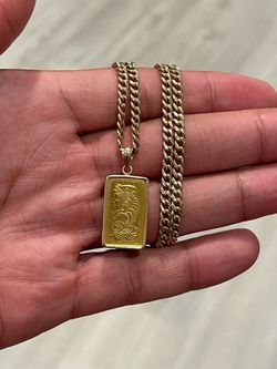 Gold chain with PAMP pendant