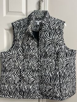 Gently used woman’s 2X zebra zipper vest. $5