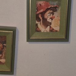 Two Framed pictures of clowns on green and gold vintage framed