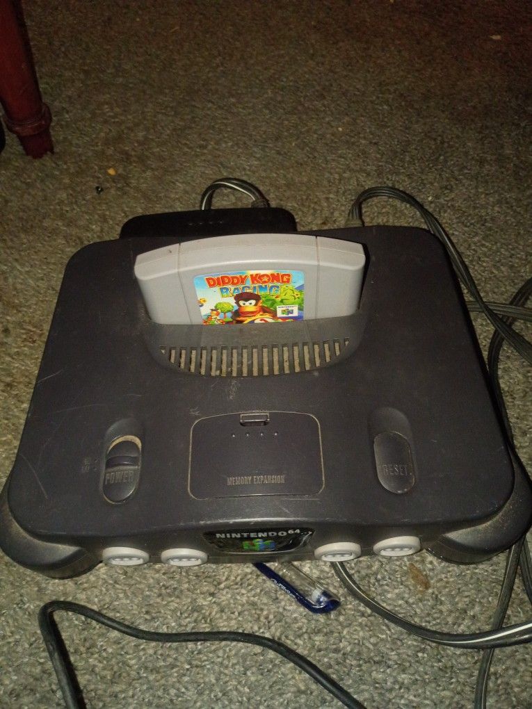 NINTENDO 64 + CABLES + CONTROLLERS