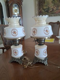 I have two antique brass and glass lamps