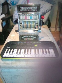 Jackpot slot bars and seven wins ready to play needs to AA batteries also have this electric piano for your kids I have all sorts they can even make t