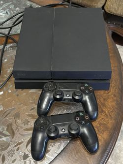 Playstation 4 and 2 controllers
