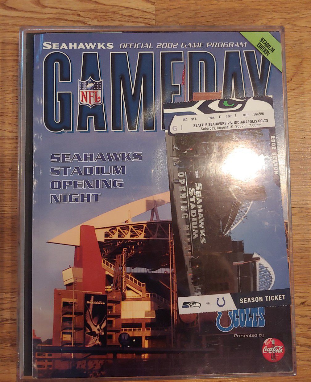 2002 seahawks ticket with brochure frames