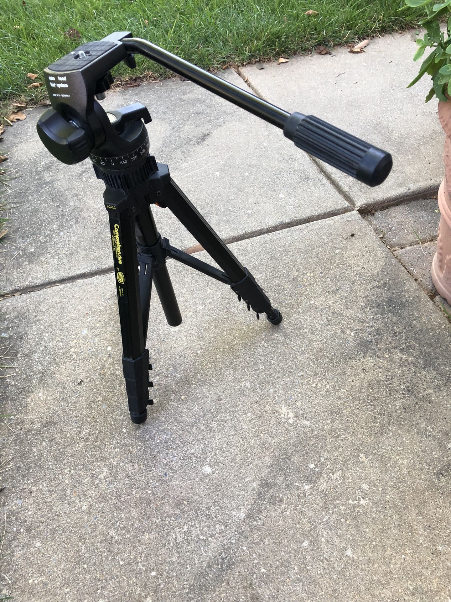 Video and photo tripod with fluid head. Germany made.
