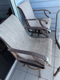Glass outdoor table with 2 captains chairs