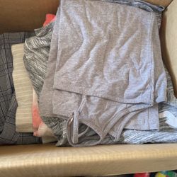 Box Of Clothes And Shoes 