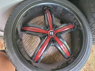 Set of 4 22 inch tires and rims.