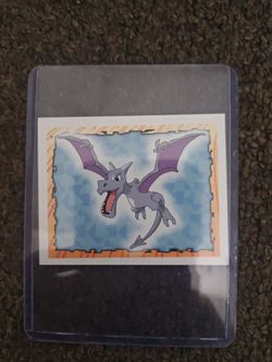 Aerodactyl Pokémon Sticker Card in Top Loader