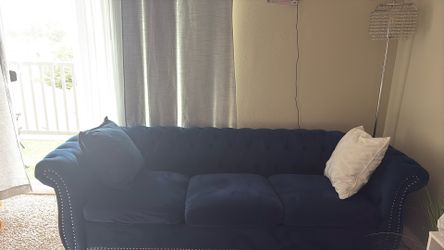 Two large sofas—one three-seater and one single-seater—in a beautiful blue color.