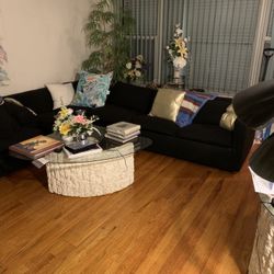 Black L Shaped Sofa With Sleeper And Coffee Table 
